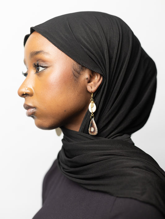 Boucles d'oreilles en os et coquillage cauri - Élégance intemporelle